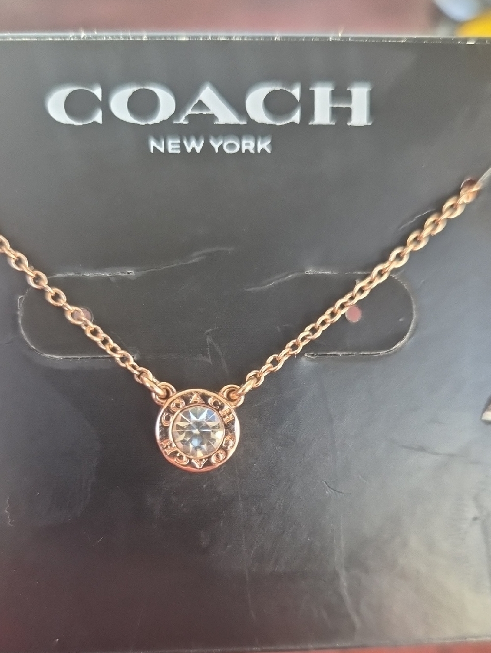 COACH Rose Gold Crystal Circle Pendant Necklace